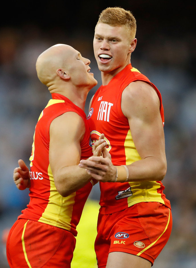 AFL 2016 Rd 12 - Richmond v Gold Coast Peter Wright celebrates a goal with his skipper Gary Ablett - ${keywords}